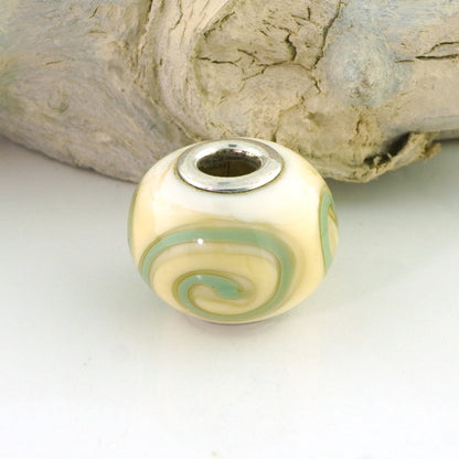 Aqua Swirls on Ivory Silver Cored Glass Charm Bead