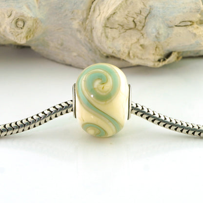 Aqua Swirls on Ivory Silver Cored Glass Charm Bead