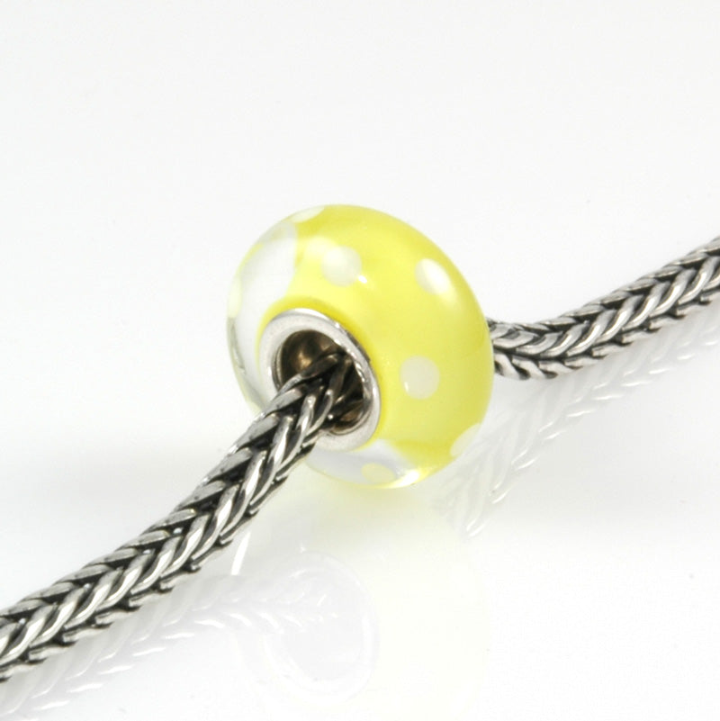 White Polka Dots on Transparent Yellow Silver Cored Glass Charm Bead
