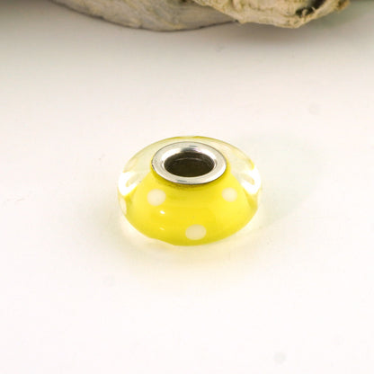White Polka Dots on Transparent Yellow Silver Cored Glass Charm Bead