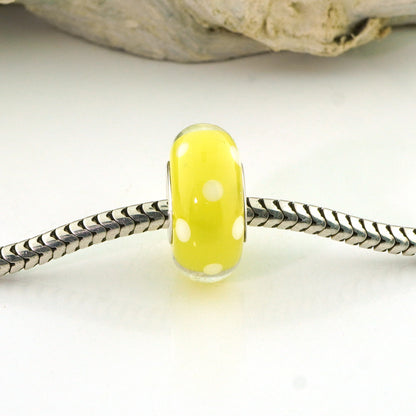 White Polka Dots on Transparent Yellow Silver Cored Glass Charm Bead